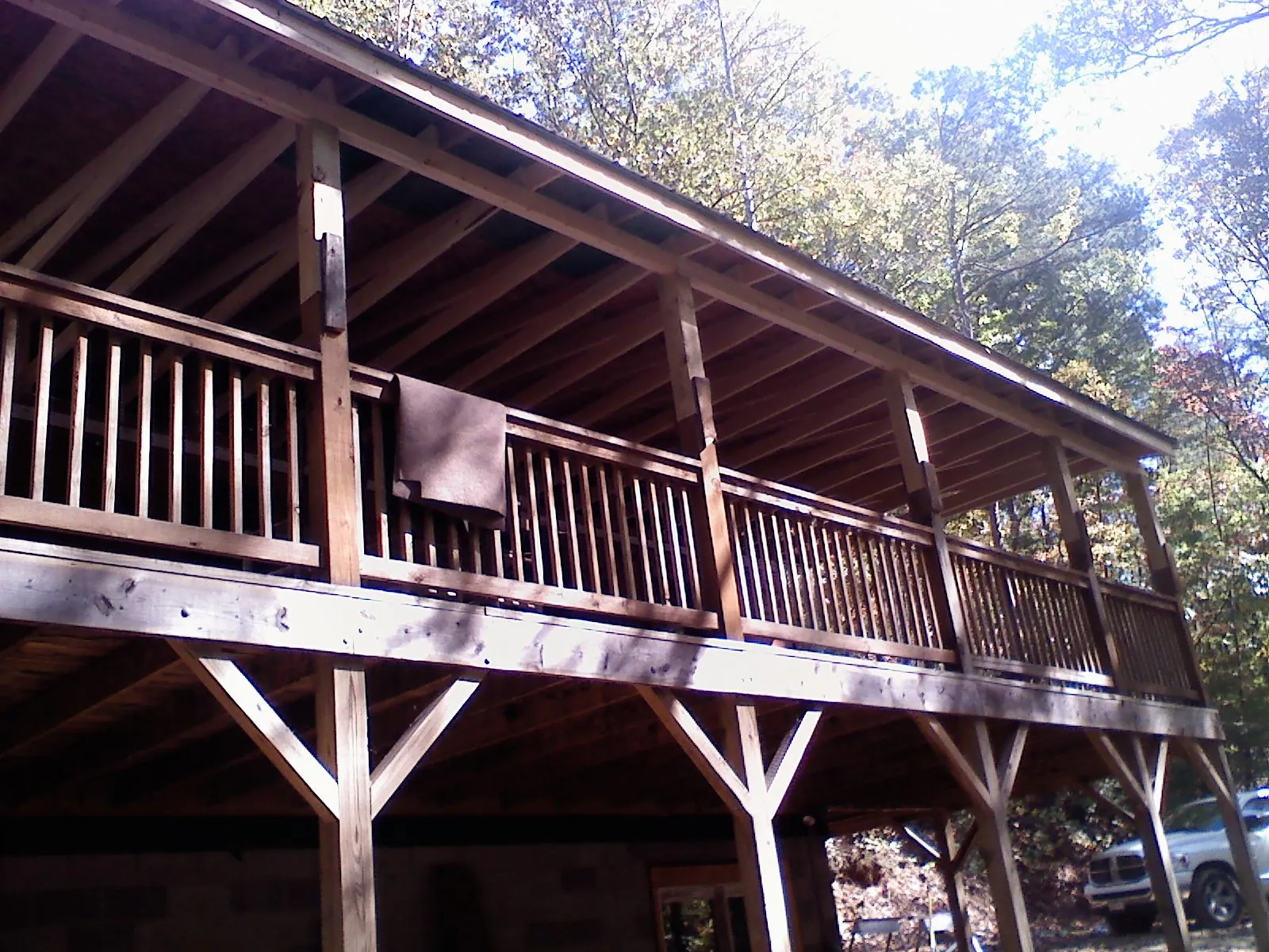 Timber framing under a new elevated porch and deck — Roof Leak Repair in Wolflake by Roofing Brothers